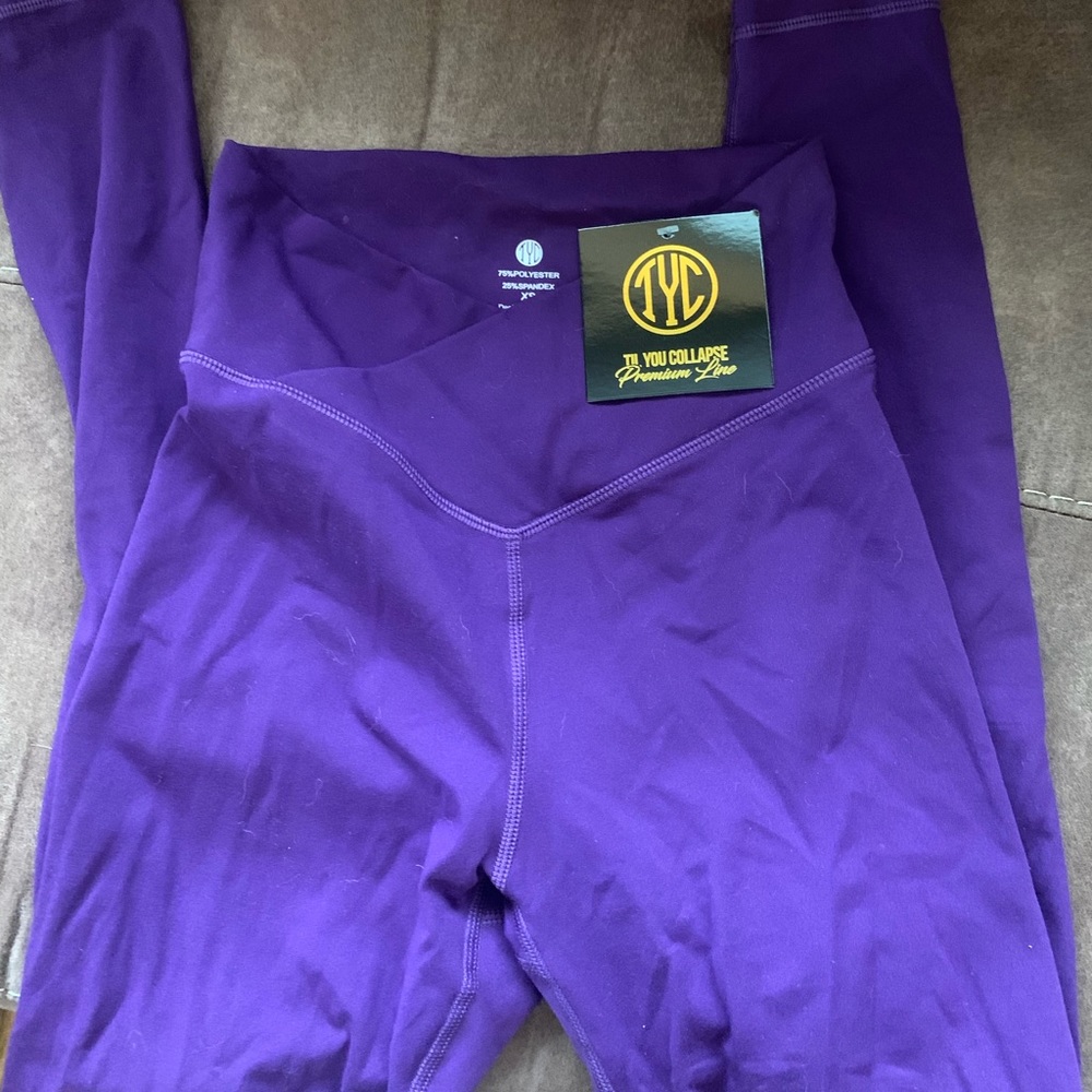 NWT TYC cross waist leggings in purple